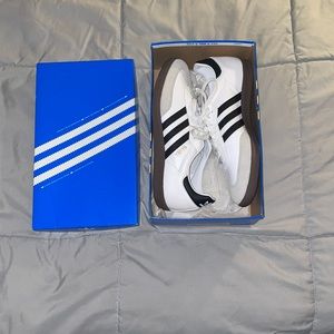 Brand new white and black Adidas sambas